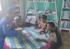 Murid SD Tanjung Perawan Membaca Buku dan Menambah Ilmu Di Pondok Baca Ditpolairud