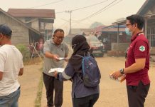 Warga Barito Utara Terdampak Kabut Asap, PT. SMM Adakan Pengobatan Gratis dan Pembagian Ribuan Masker